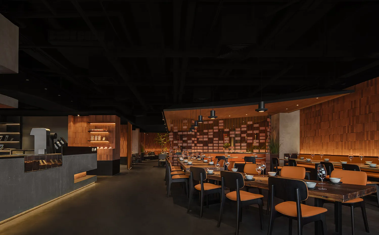 Modern restaurant interior with wooden elements and contemporary decor.