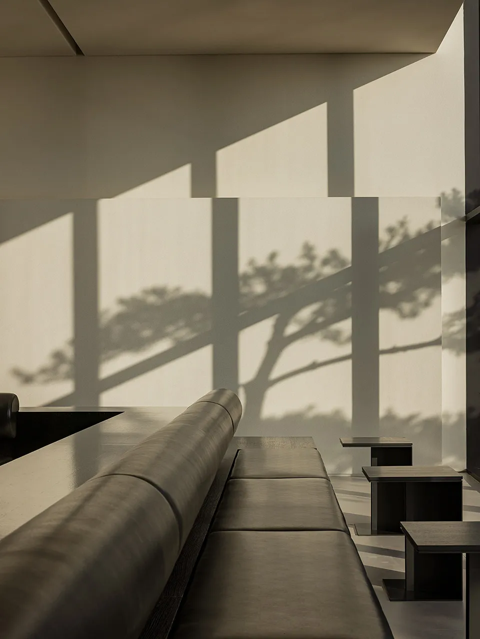 Minimalist modern interior design with sleek lines and natural light.