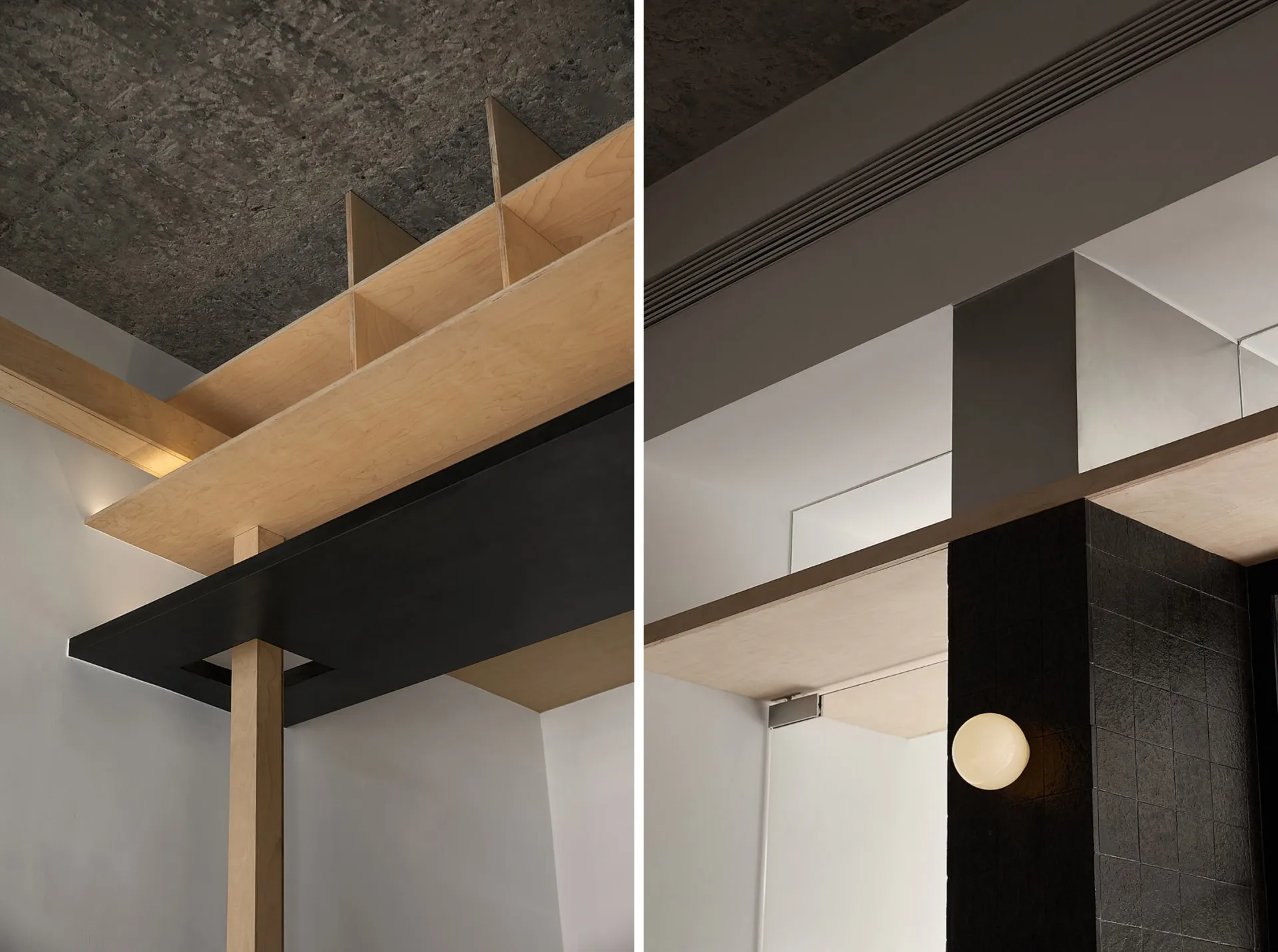 Modern office space featuring wooden partitions, concrete floor, and metal accents.