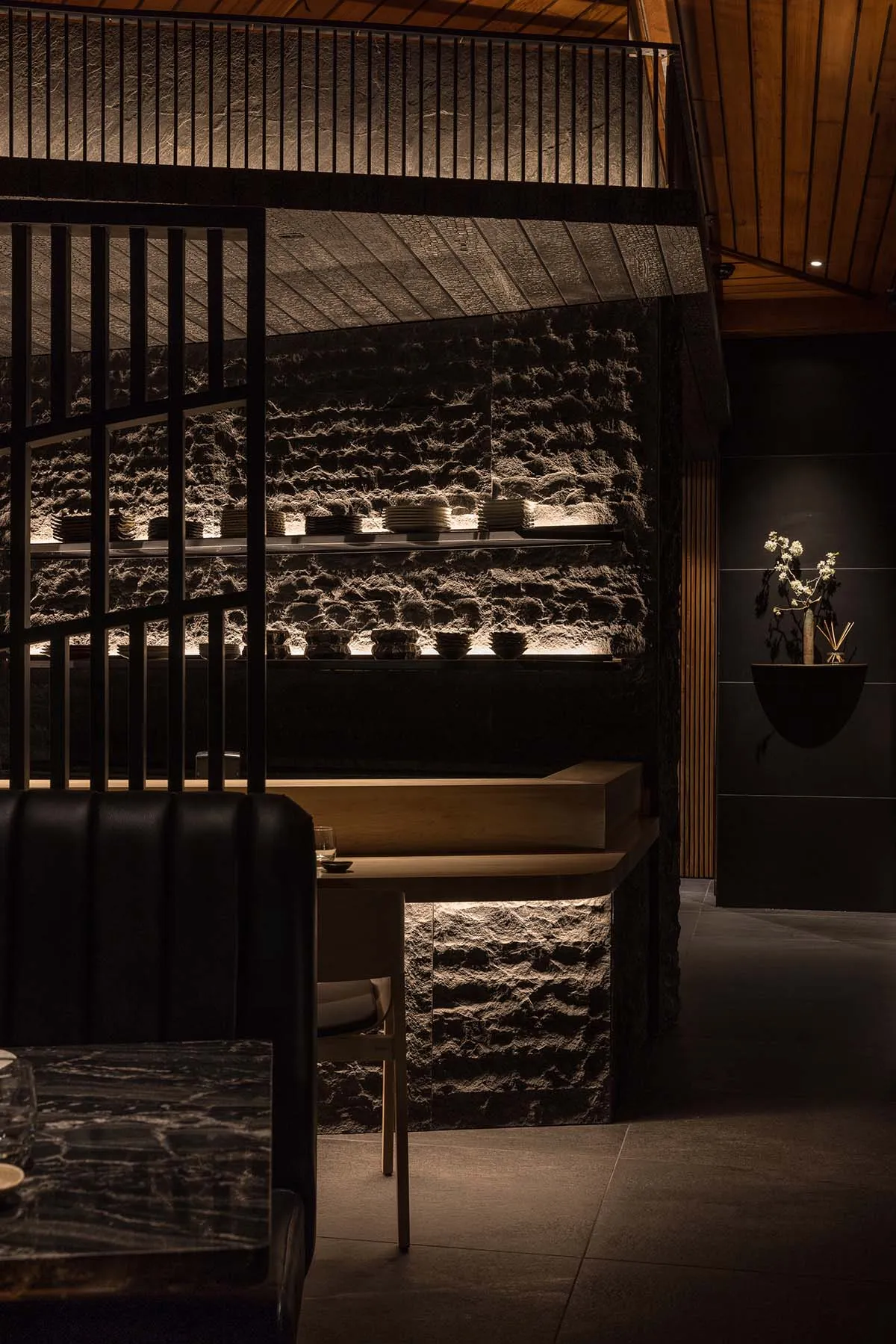 Lighting and stone wall in a restaurant interior
