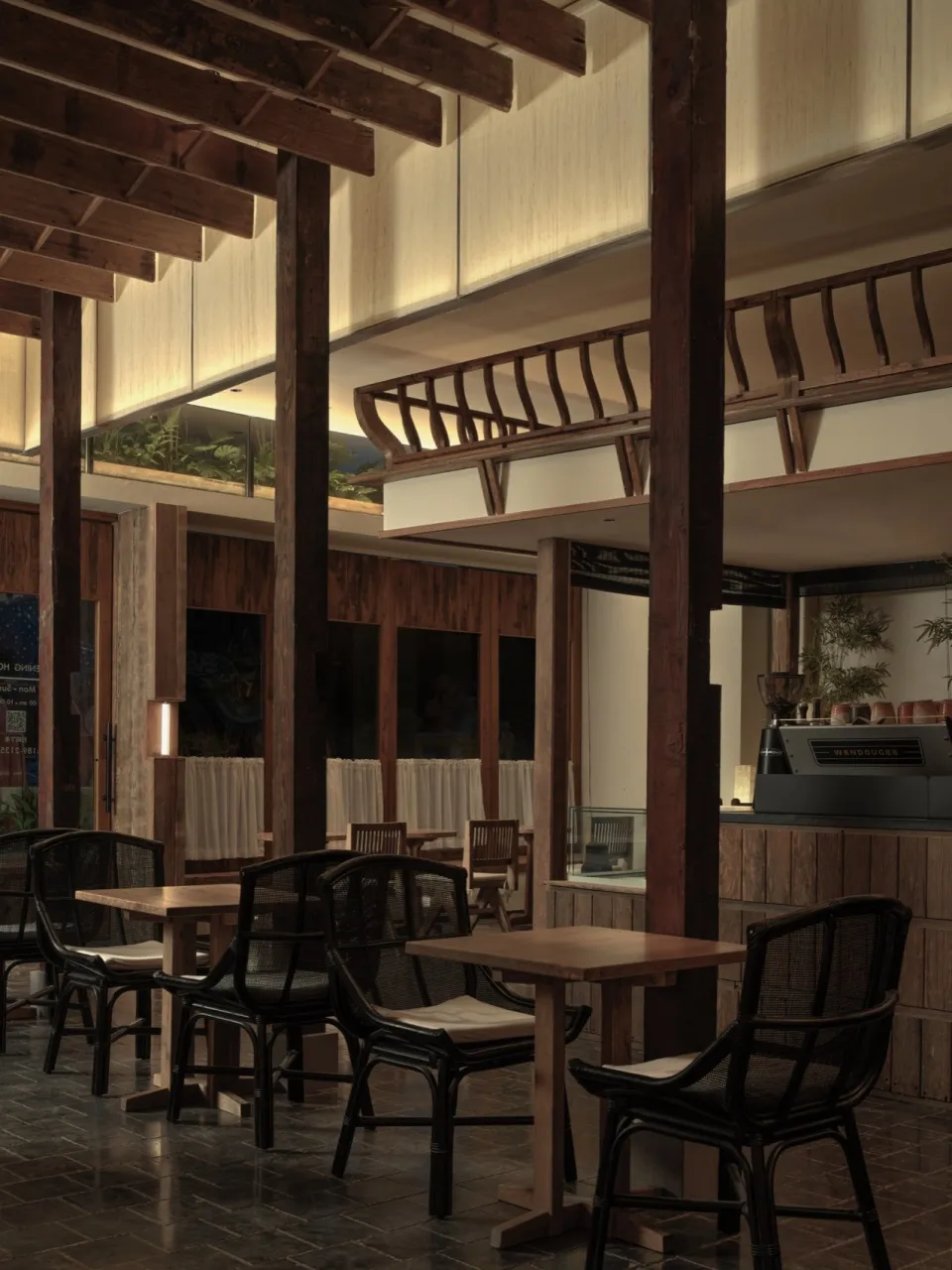 Industrial-themed restaurant interior with wooden elements and rustic ambiance