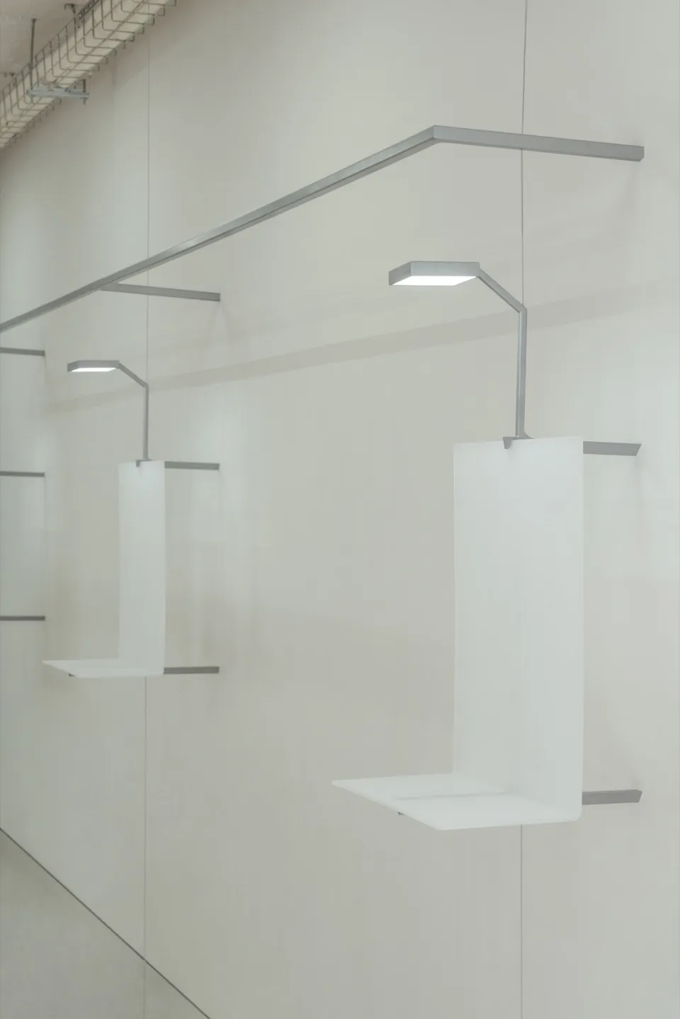 White metal shelves with minimalist design.