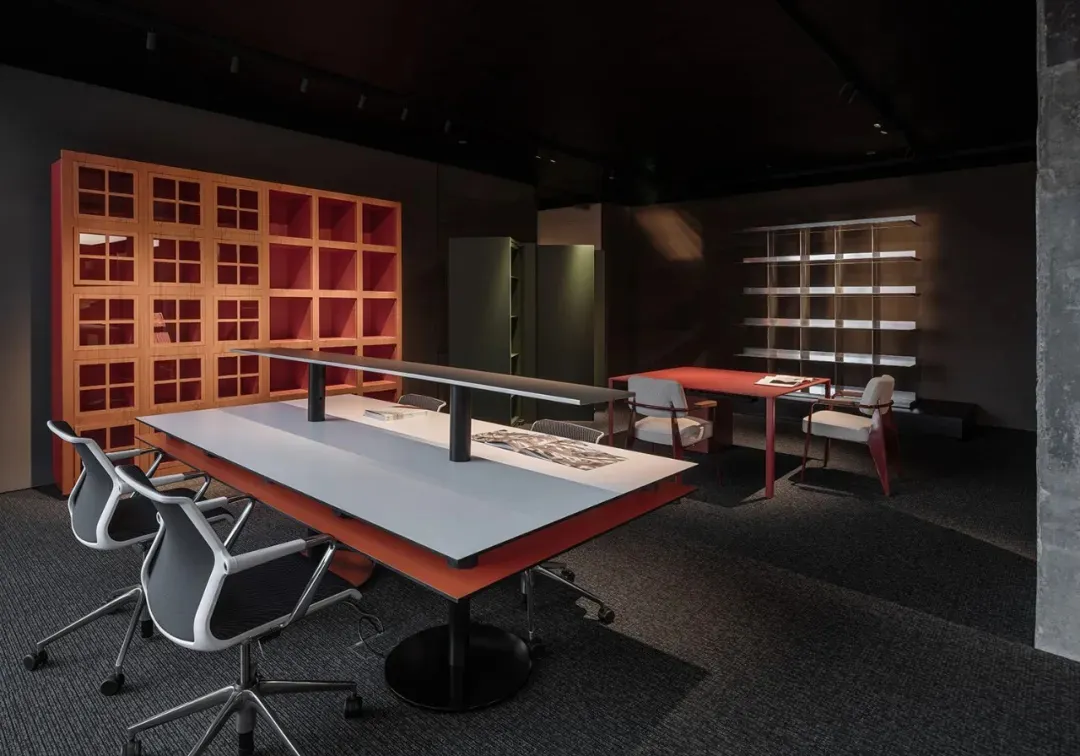 A modern office space featuring metal, redwood, and concrete materials.