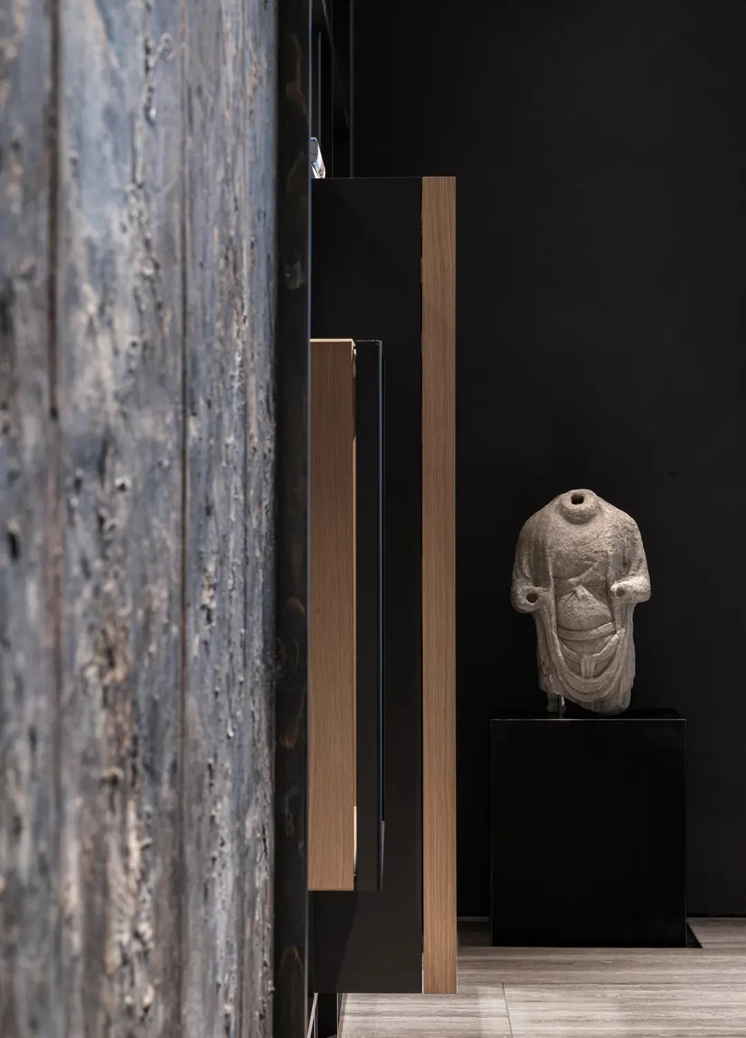 Modern minimalist interior design featuring wooden elements.