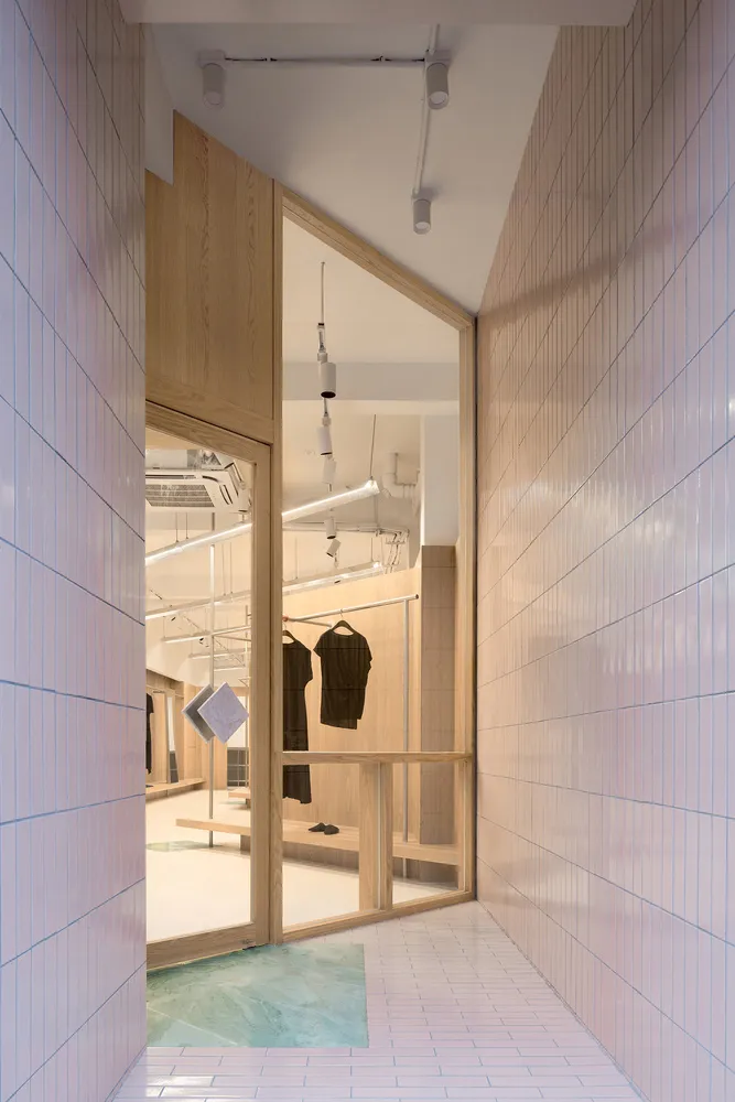 Modern retail shop interior featuring wooden elements.