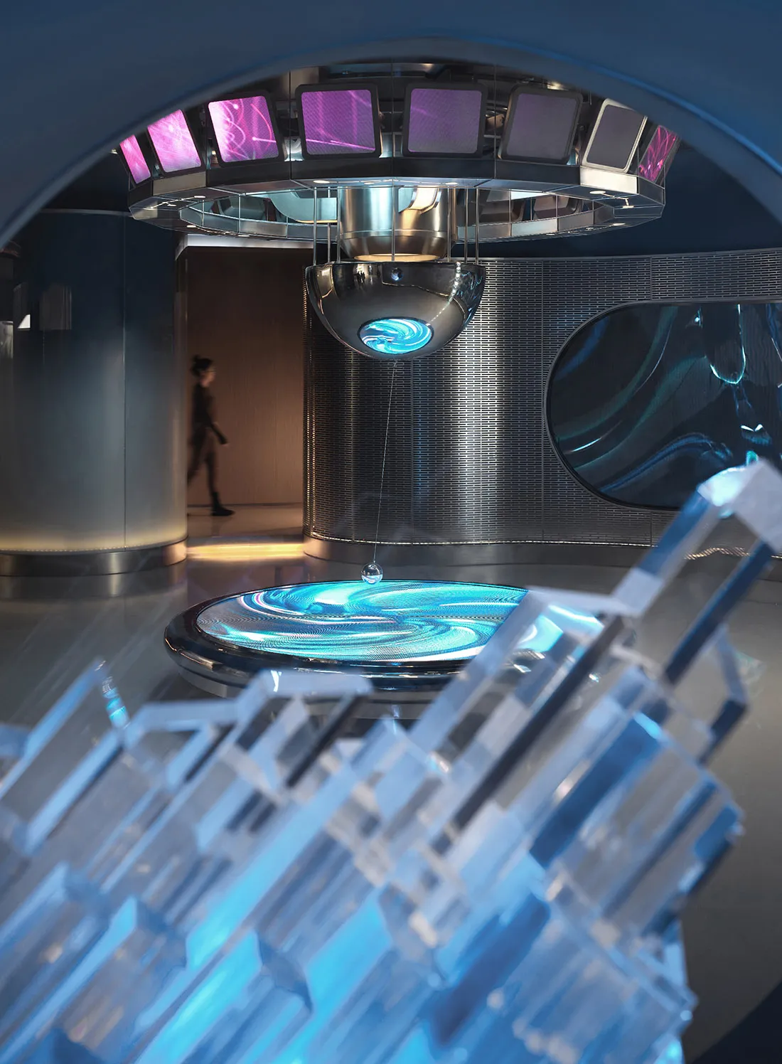 A modern laboratory interior featuring metallic and glass elements.