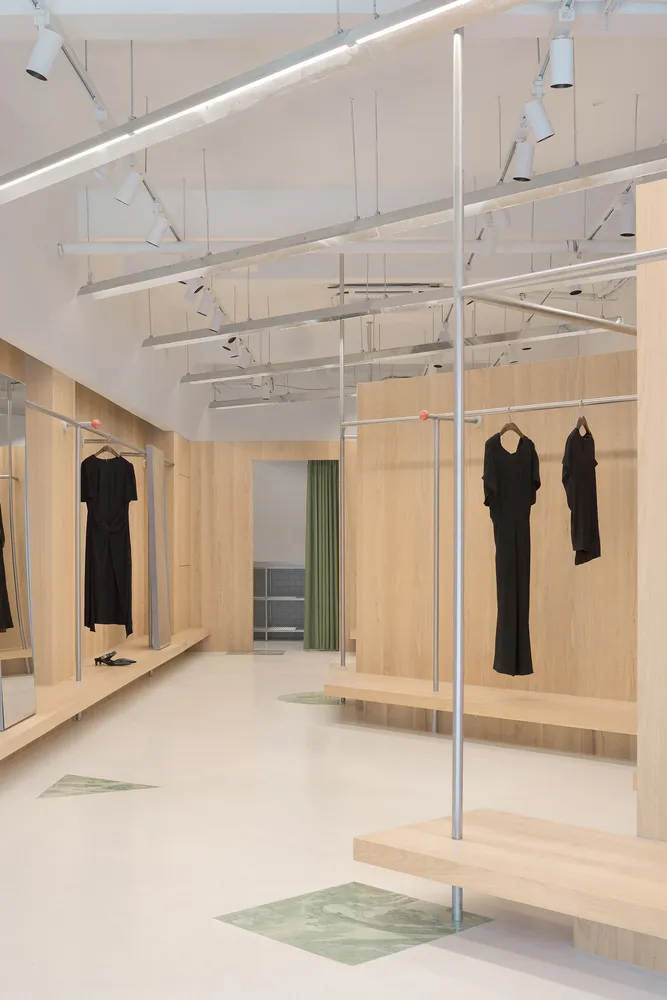 A modern retail store interior featuring wood elements.
