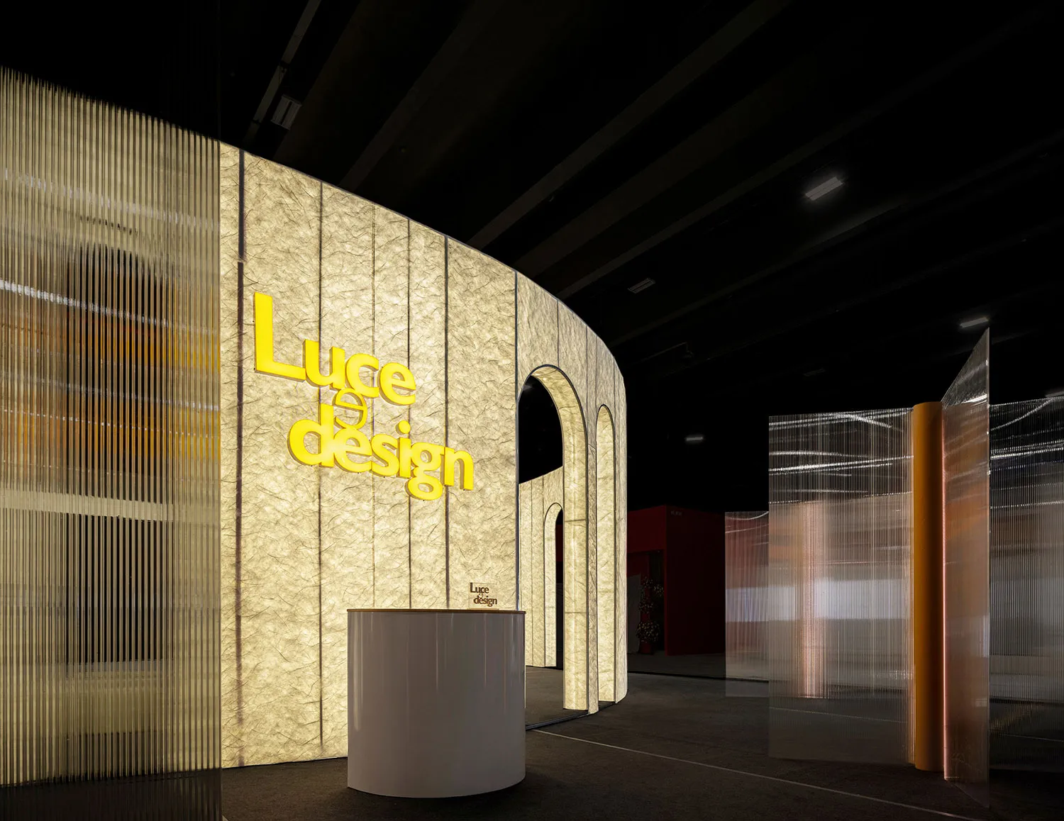 The storefront of a retail store with a metal facade and interior design elements.