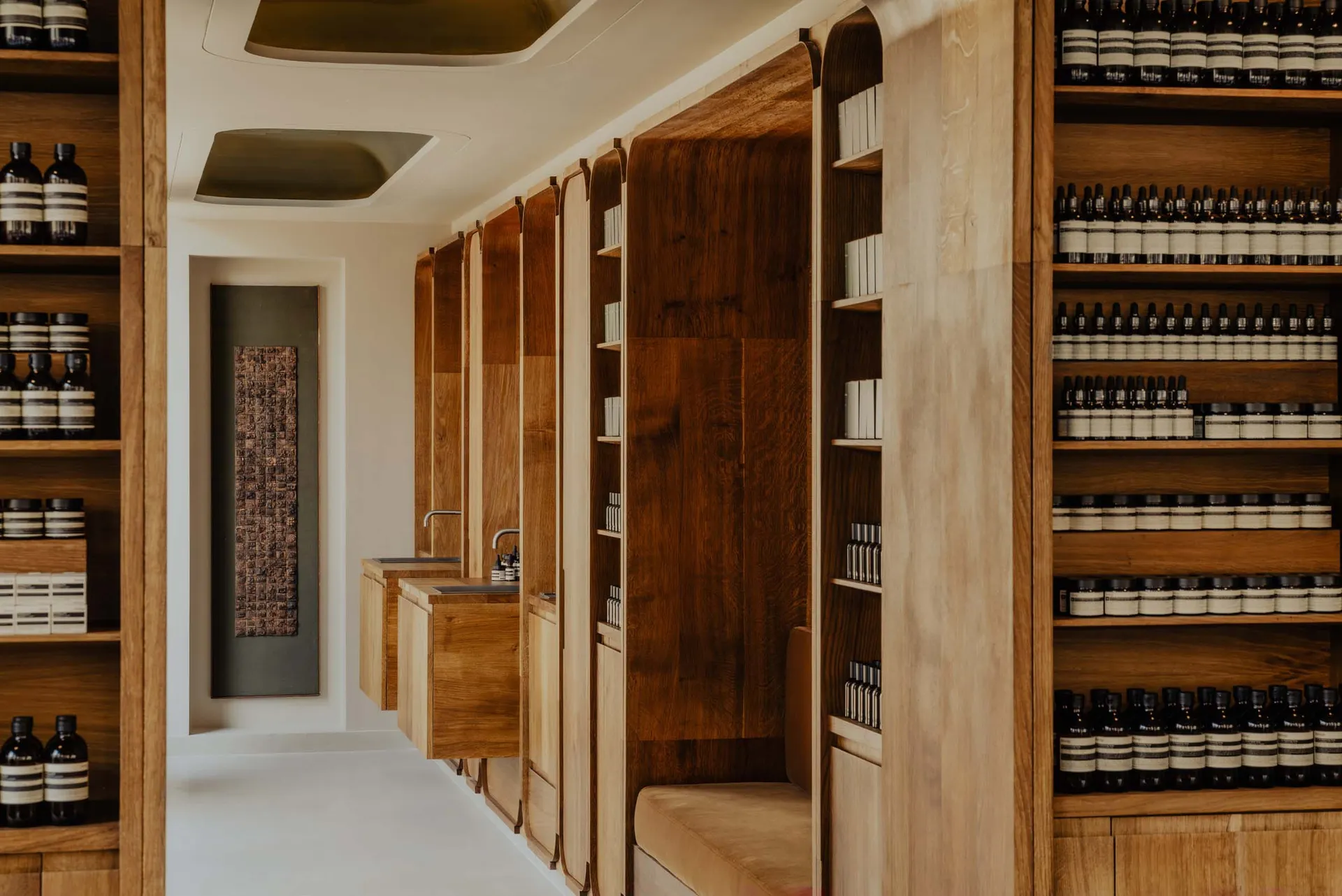 Modern spa interior featuring minimalist design and wooden panels.
