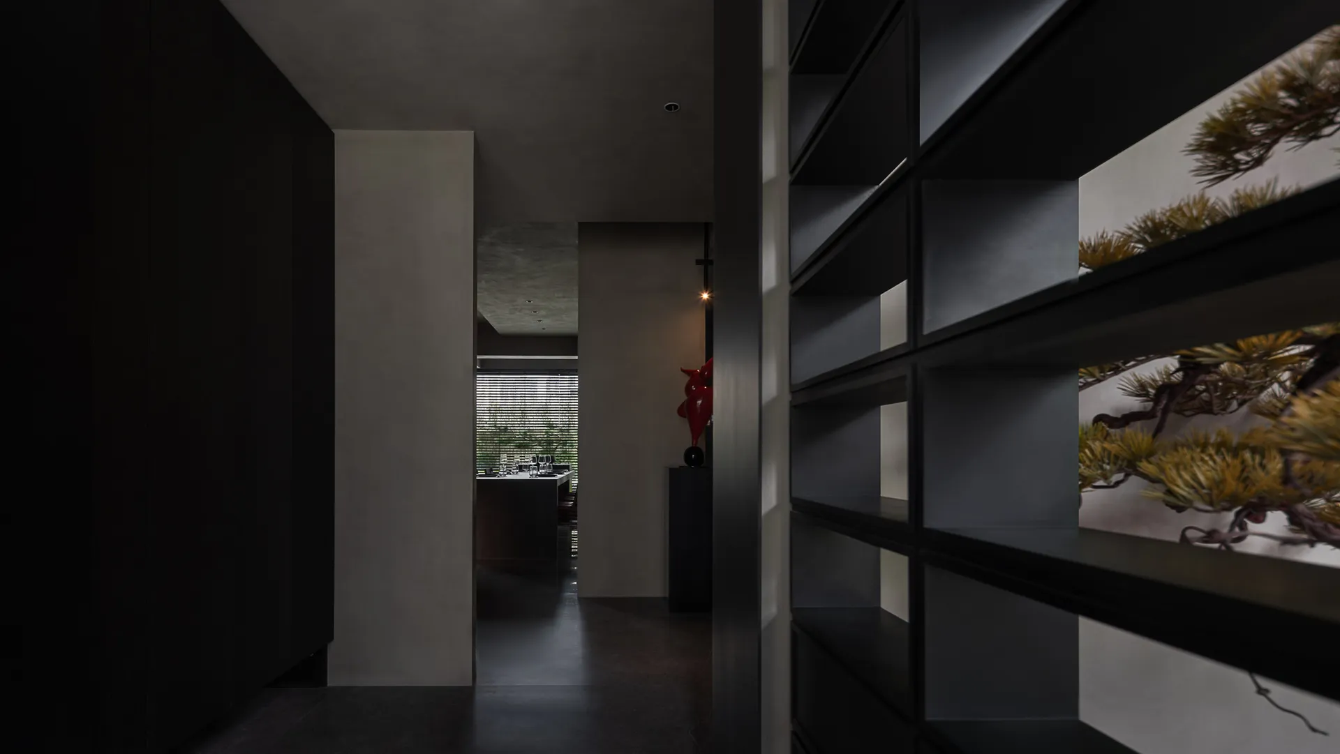 A modern interior space featuring glass elements.