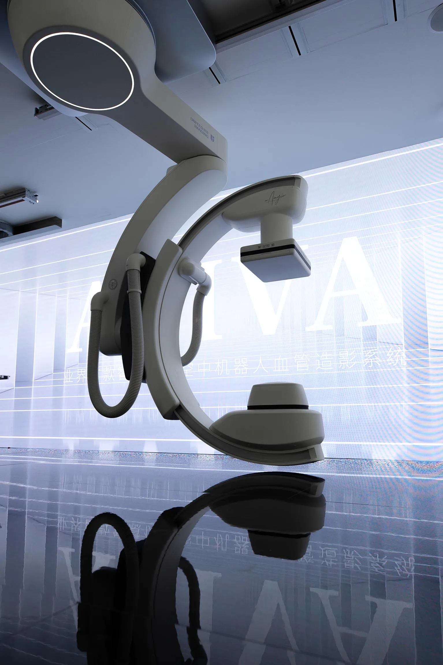 Modern medical imaging system with white large letters on the wall