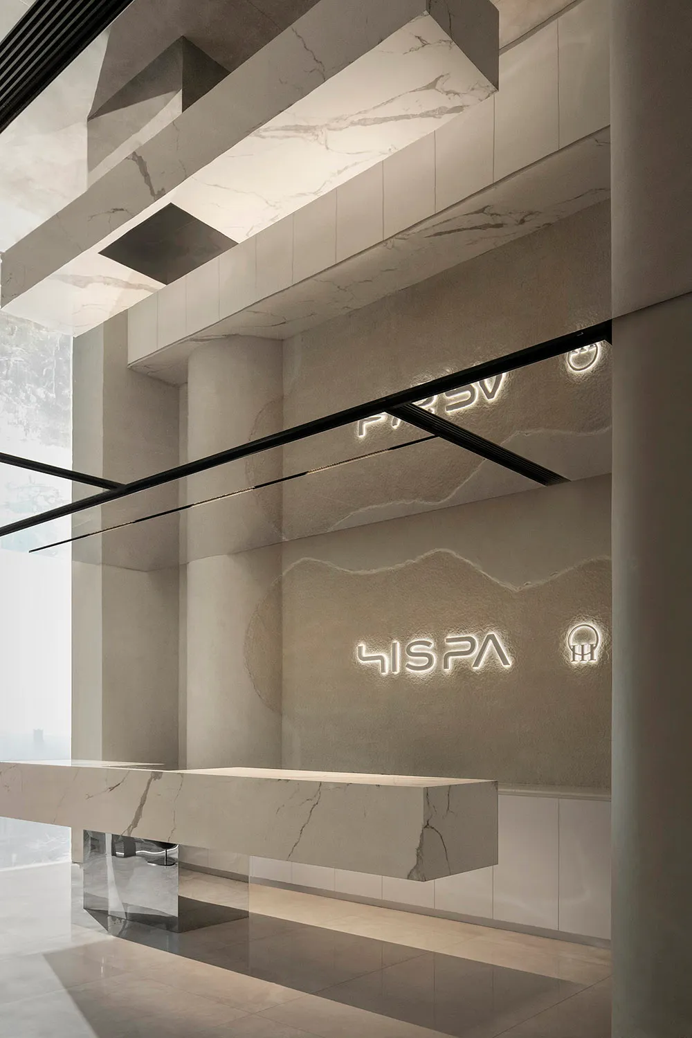 Modern spa interior featuring marble materials and minimalist design