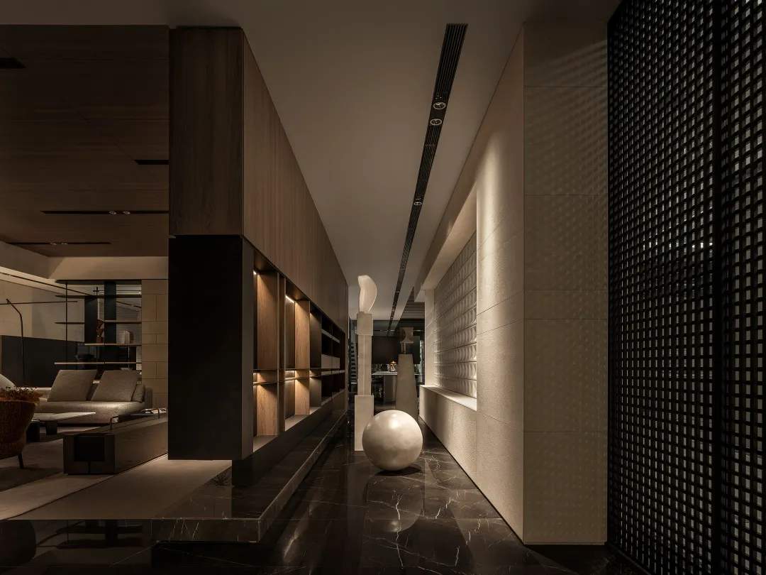 Modern minimalist living room with wooden furniture and dark flooring.