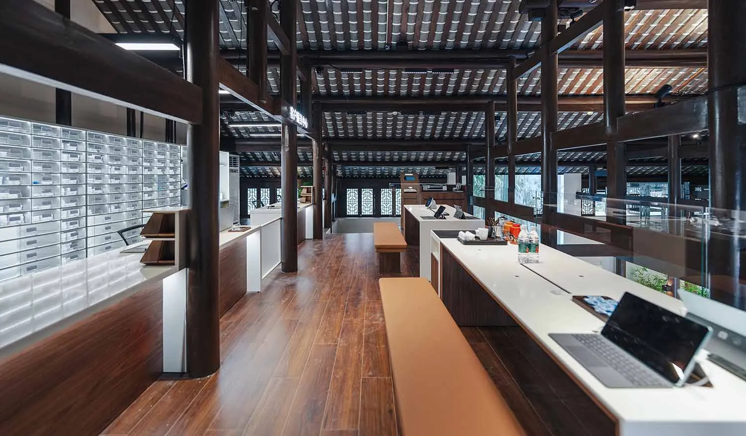 A traditional coffee shop with wooden features and a sleek design.