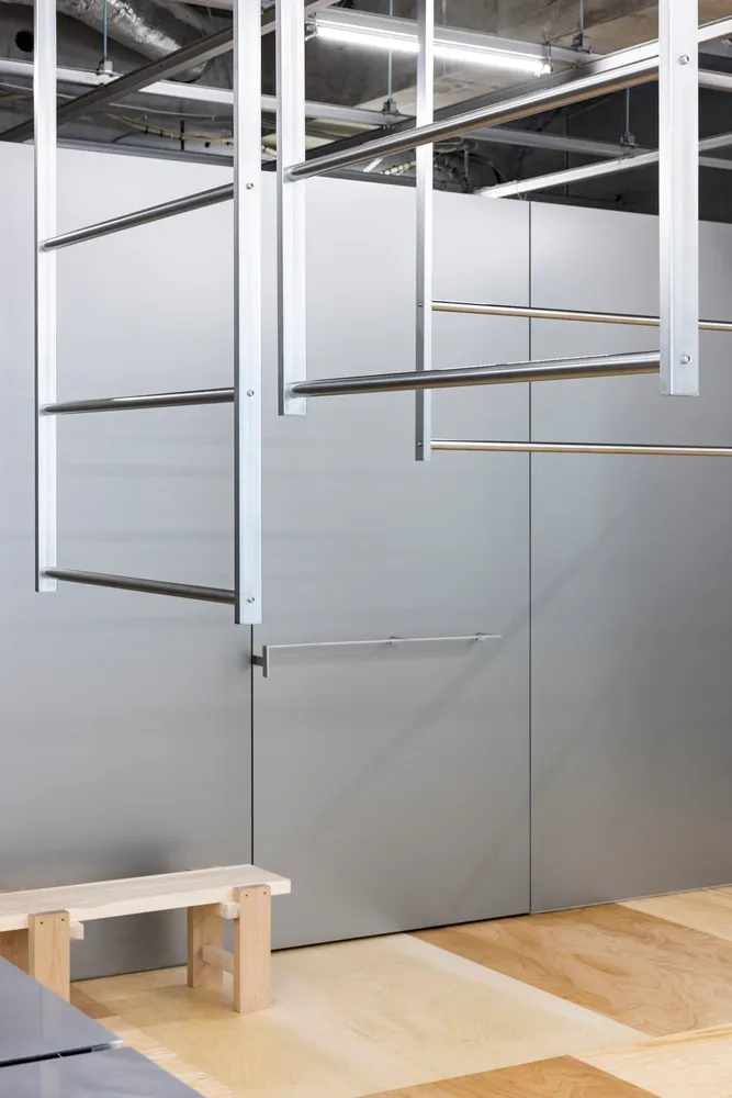 Modern industrial office space featuring metal and wood elements