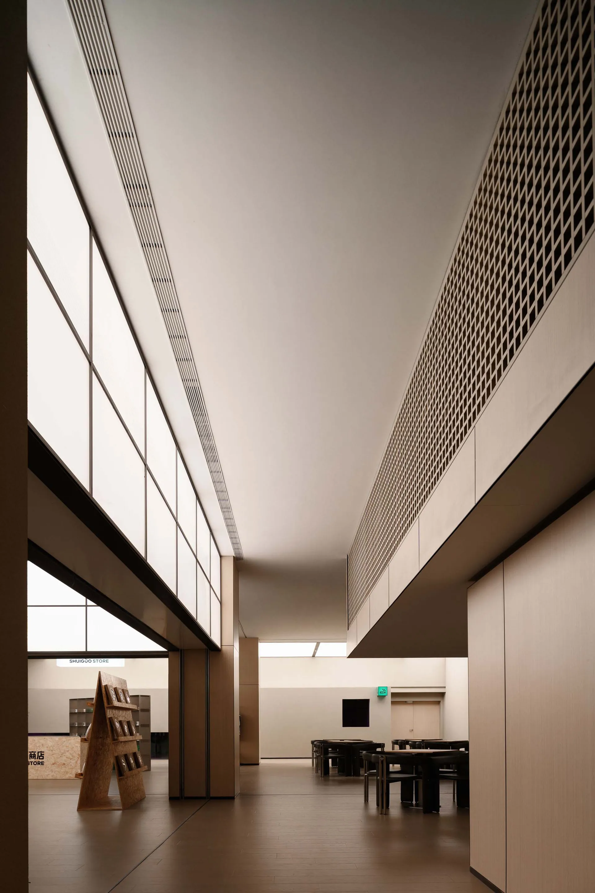 Modern minimalist office space with concrete walls and flooring
