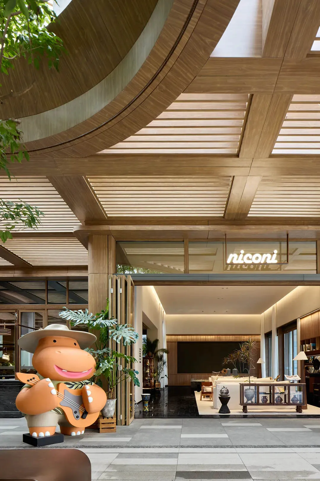 A modern hotel lobby featuring wooden elements.