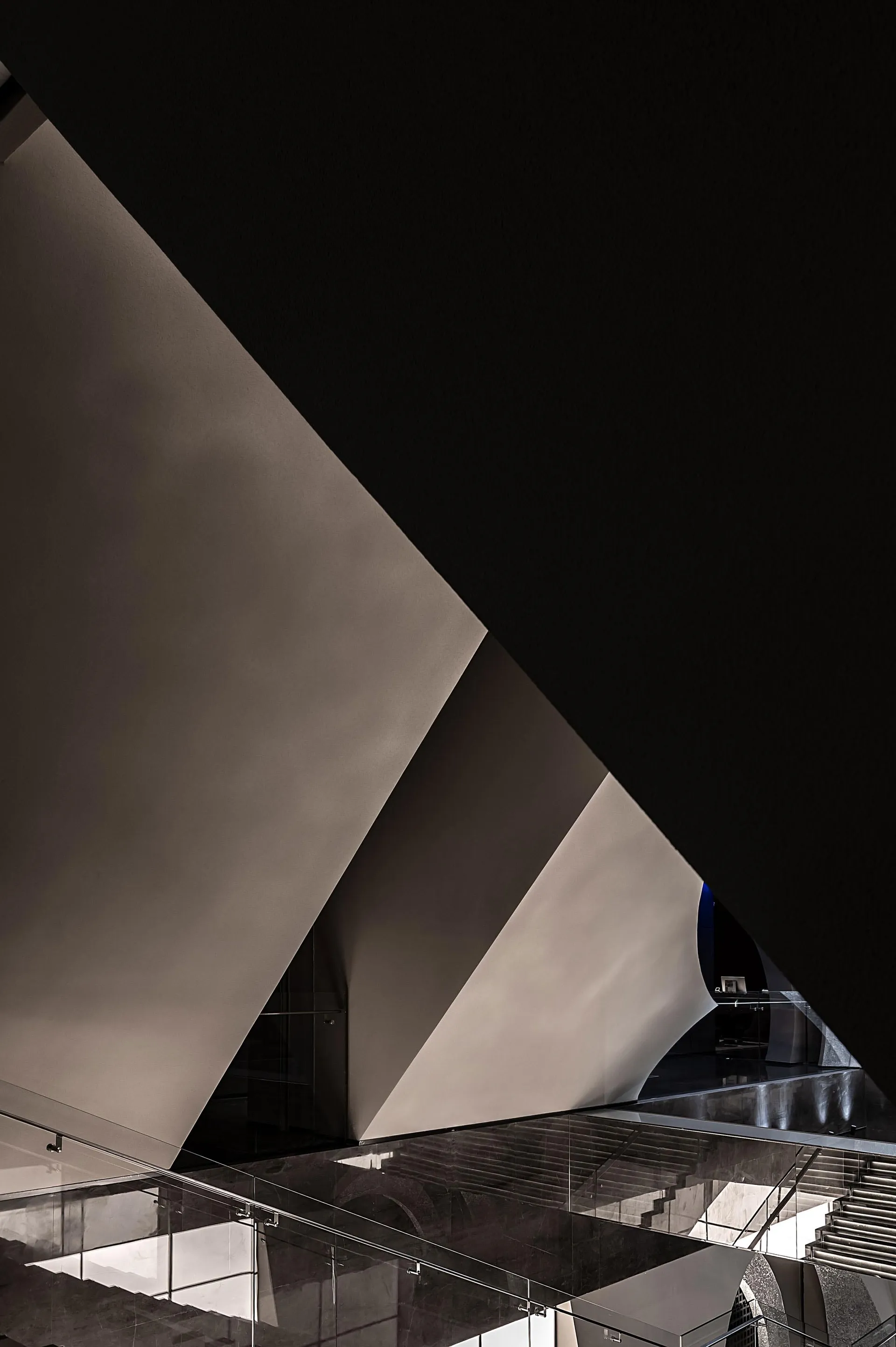 Modern interior design featuring metallic minimalist architecture.