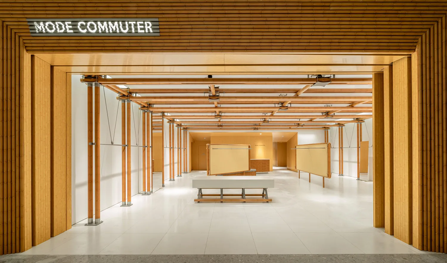 Modern retail storefront with wood panels and white flooring
