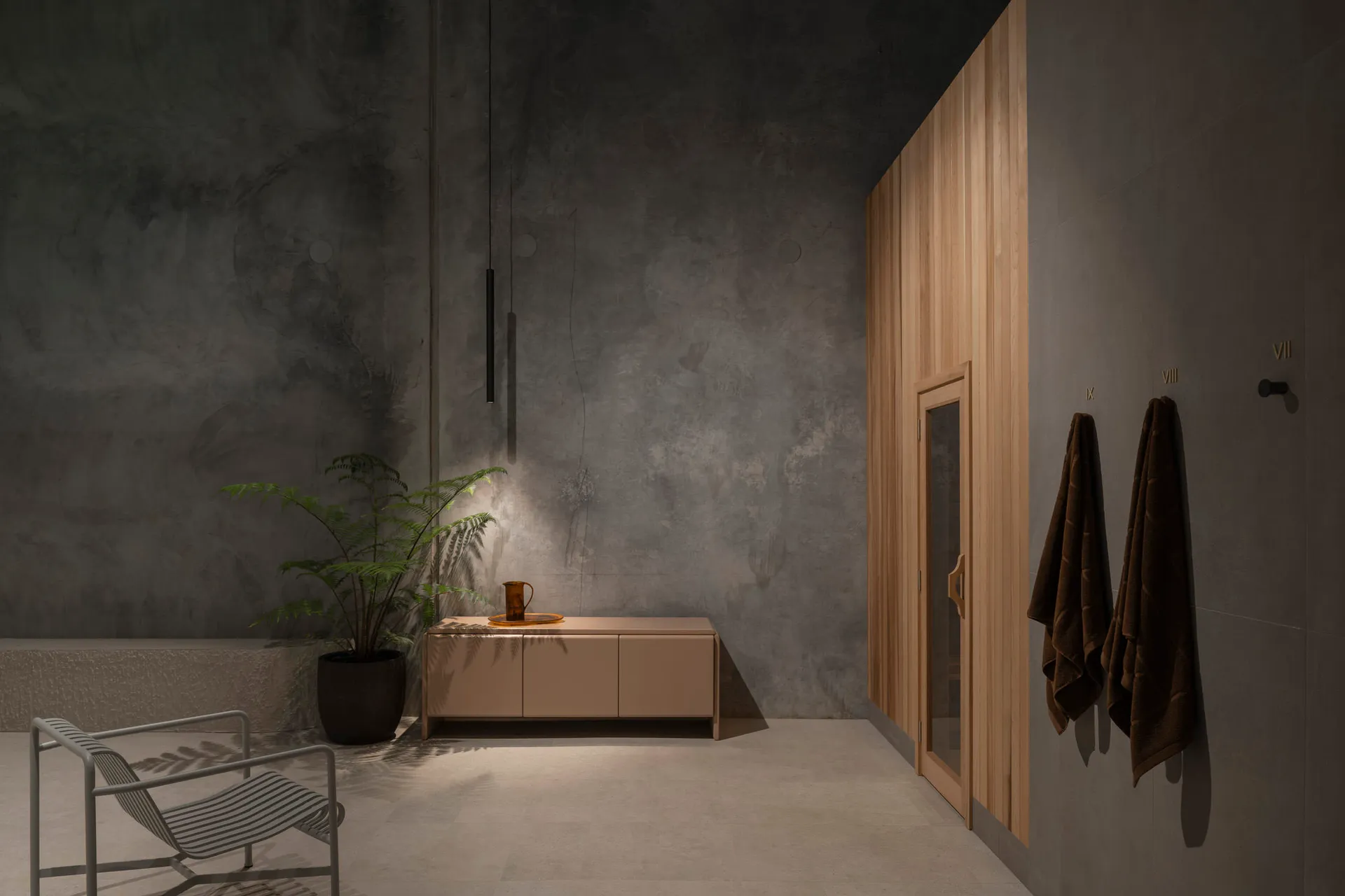 A minimalist bathroom with a concrete wall, a wooden cabinet, and a plant.