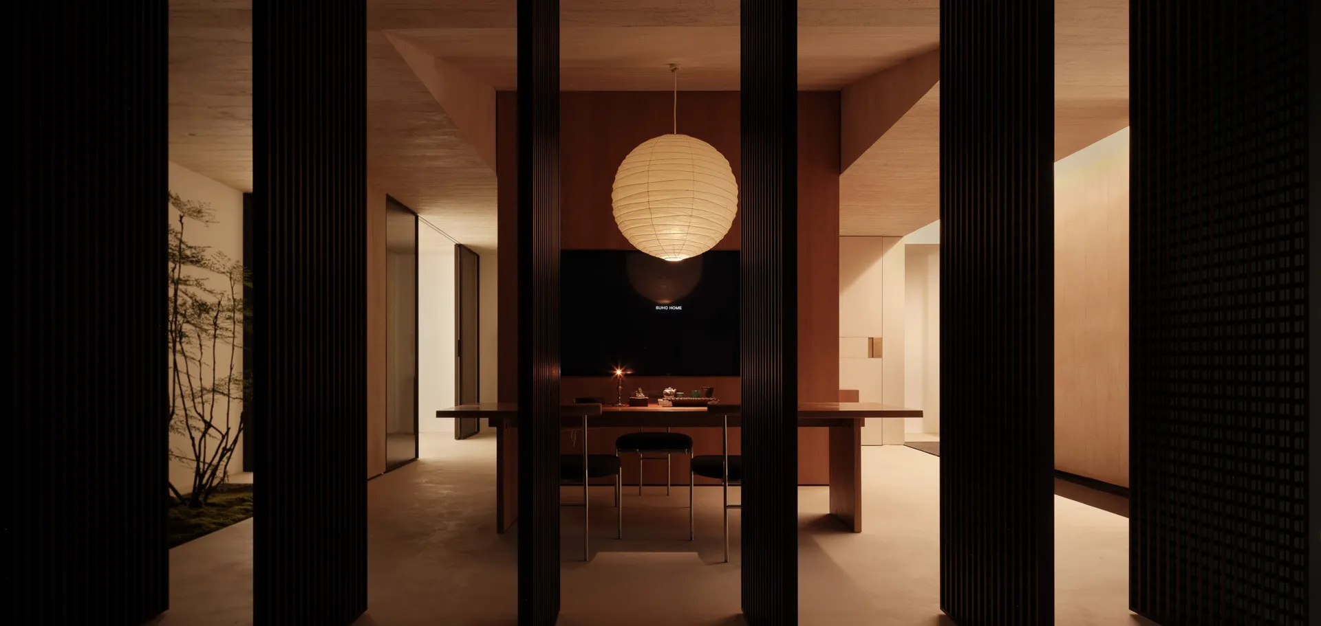 A modern dining room featuring wooden surfaces and lighting