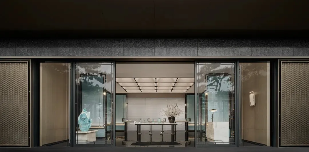 Modern storefront with large glass windows and sleek, contemporary design.