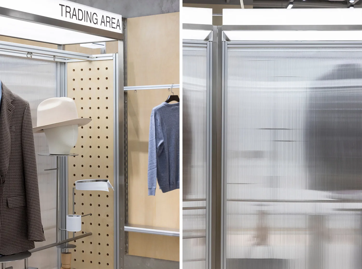 A trading area display featuring metal shelving and clothing racks.