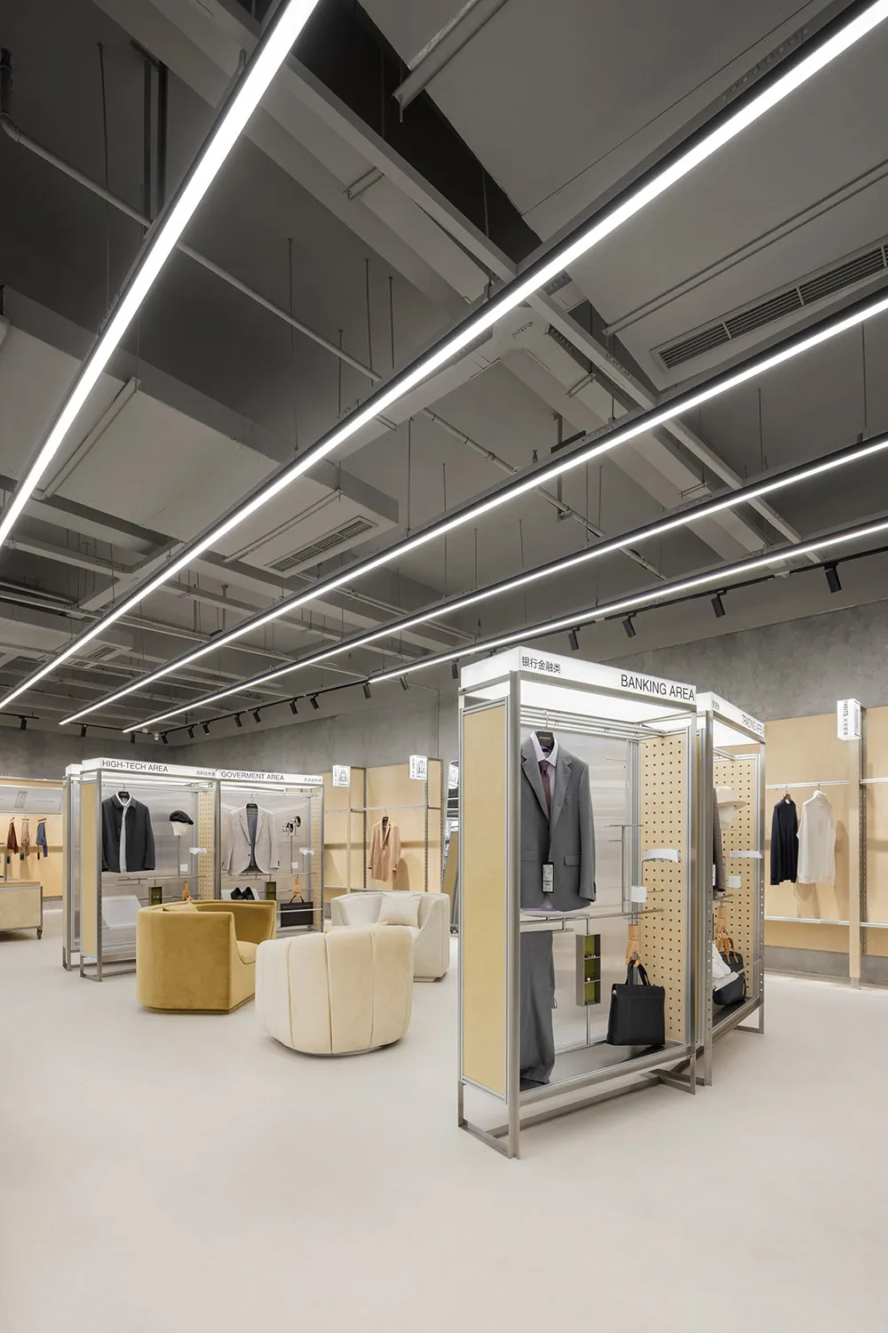 Interior design of a modern retail shop featuring metal, glass, and wood elements.
