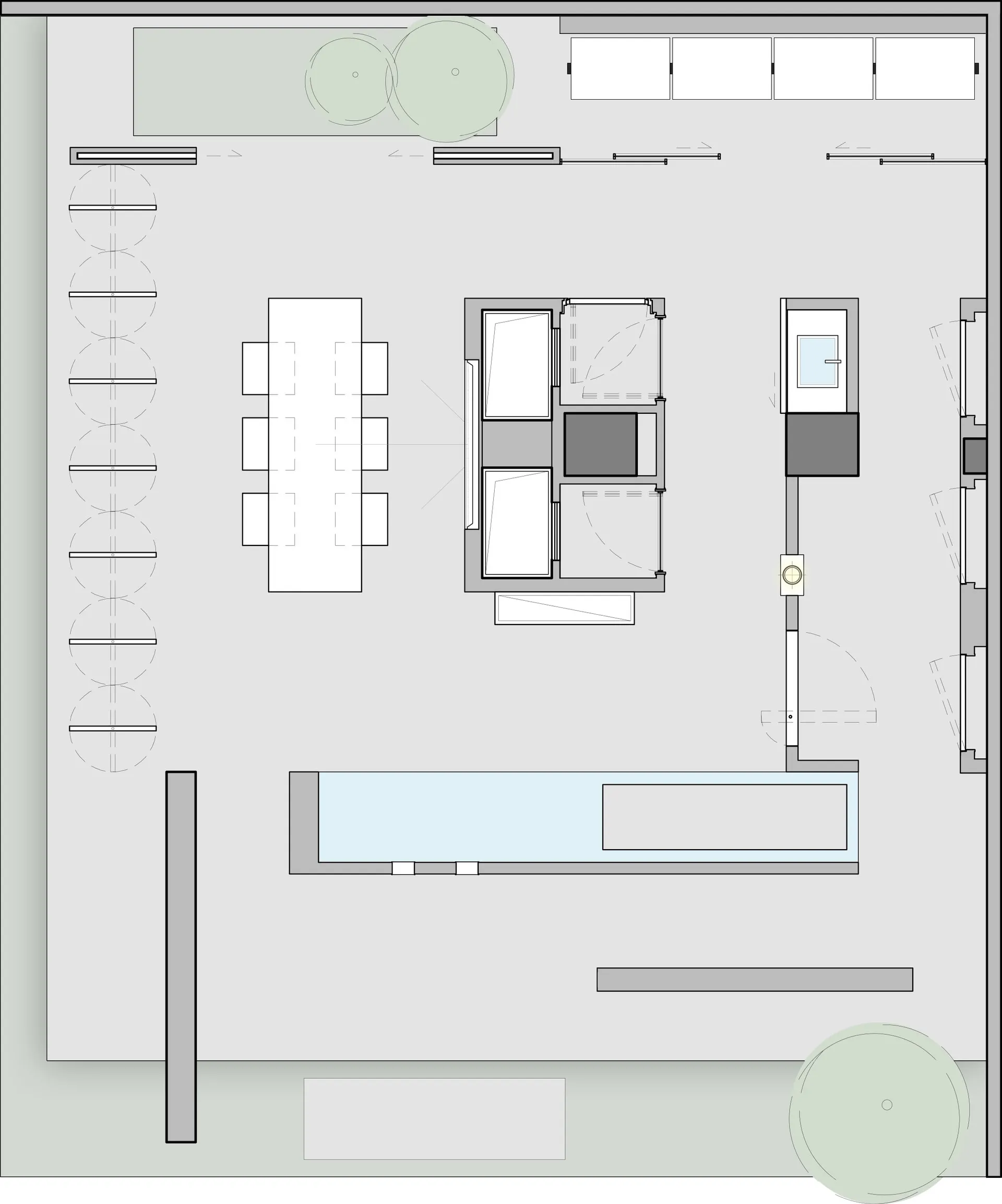Modern office space with contemporary furniture layout, featuring white and grey color palette.