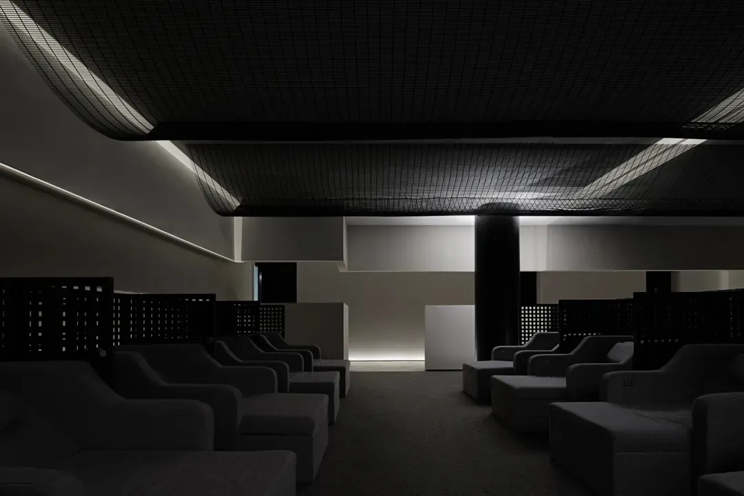 Modern seating arrangement with fabric upholstery in a contemporary interior space