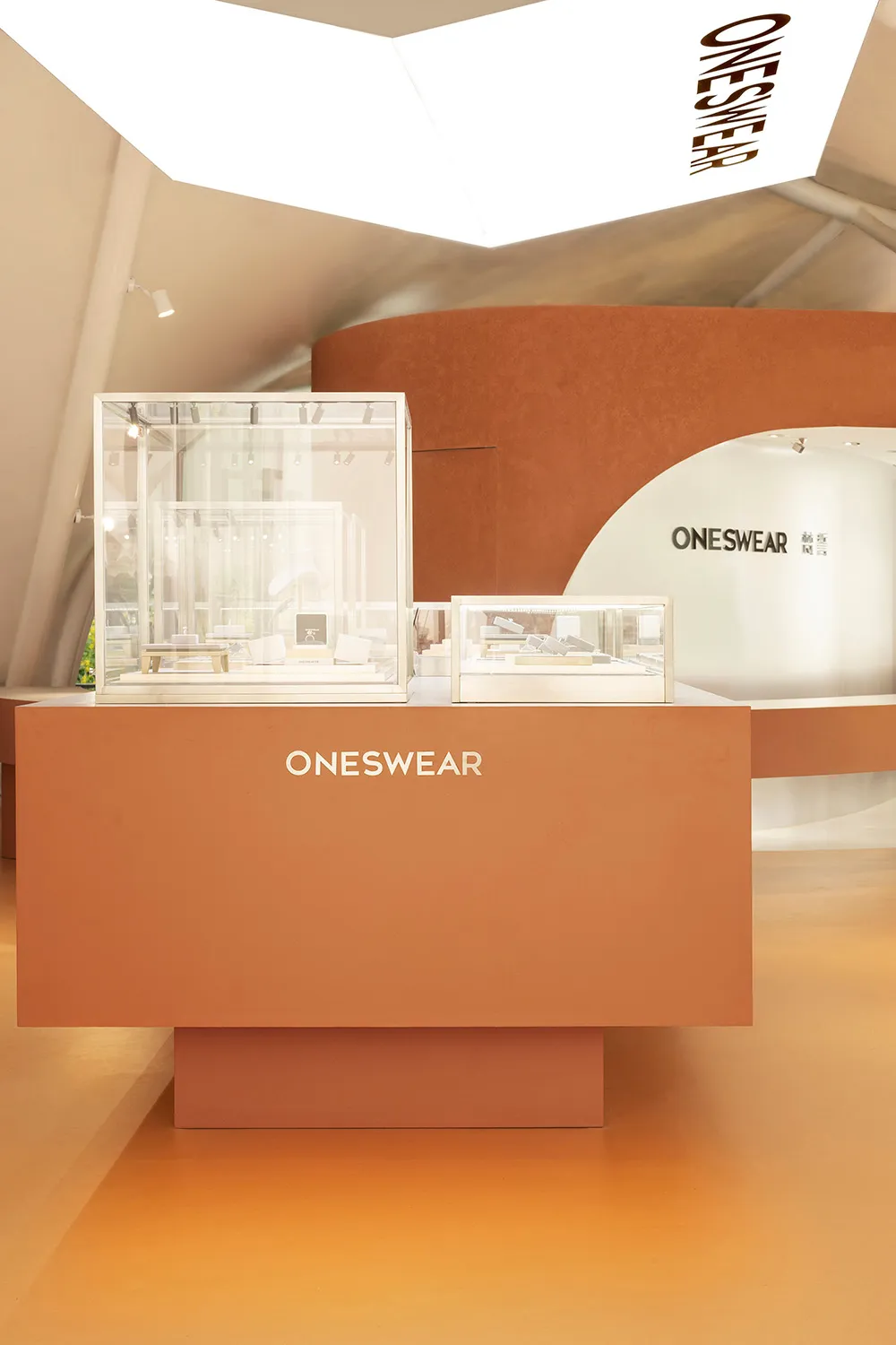 A minimalist retail shop interior featuring wood elements and modern design.