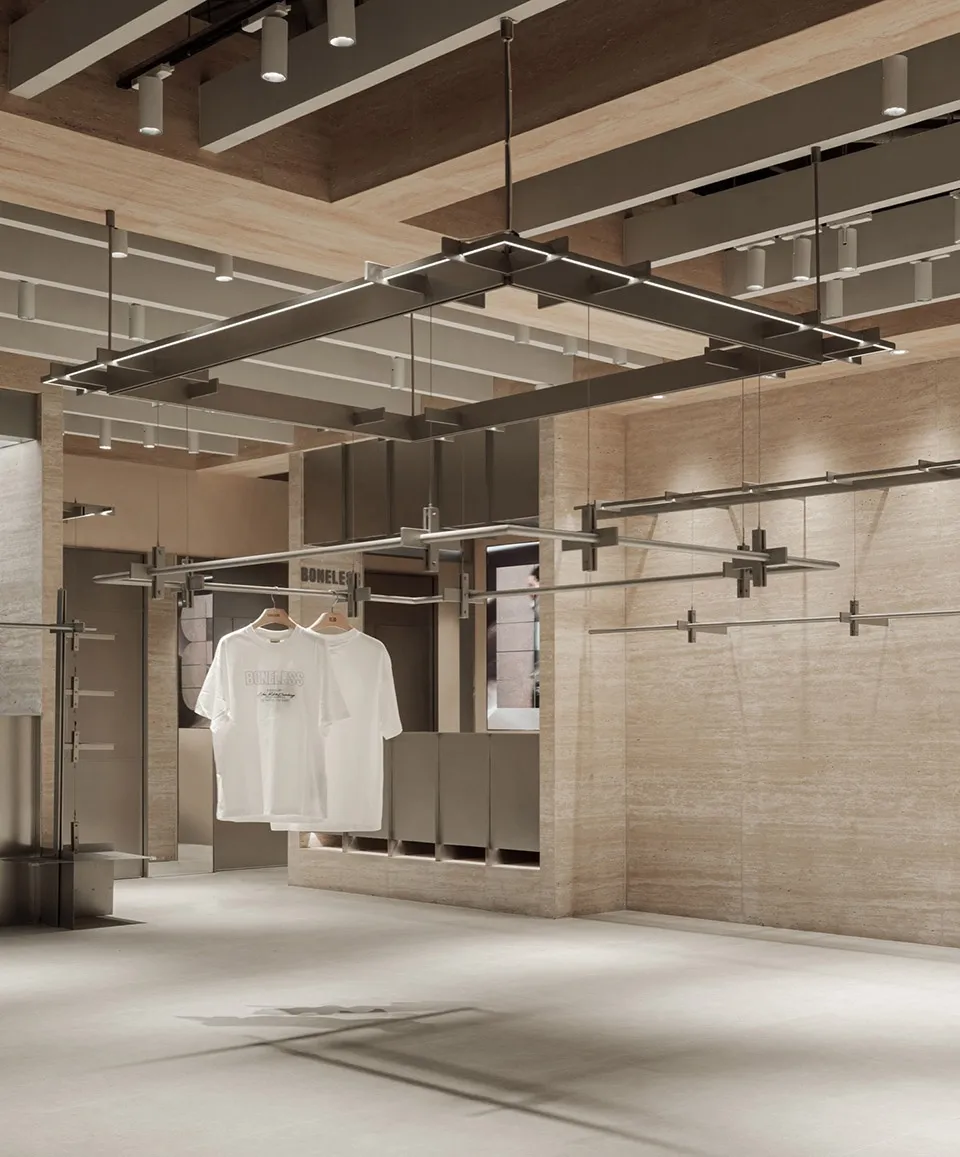 Modern retail interior with concrete walls and minimalistic design.