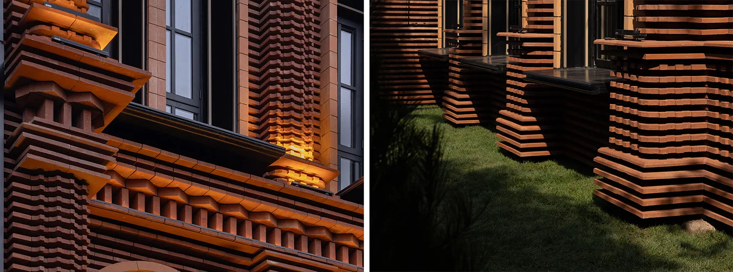 Close-up of a clay-tiled exterior architectural design featuring terracotta tiles arranged in a patterned fashion.