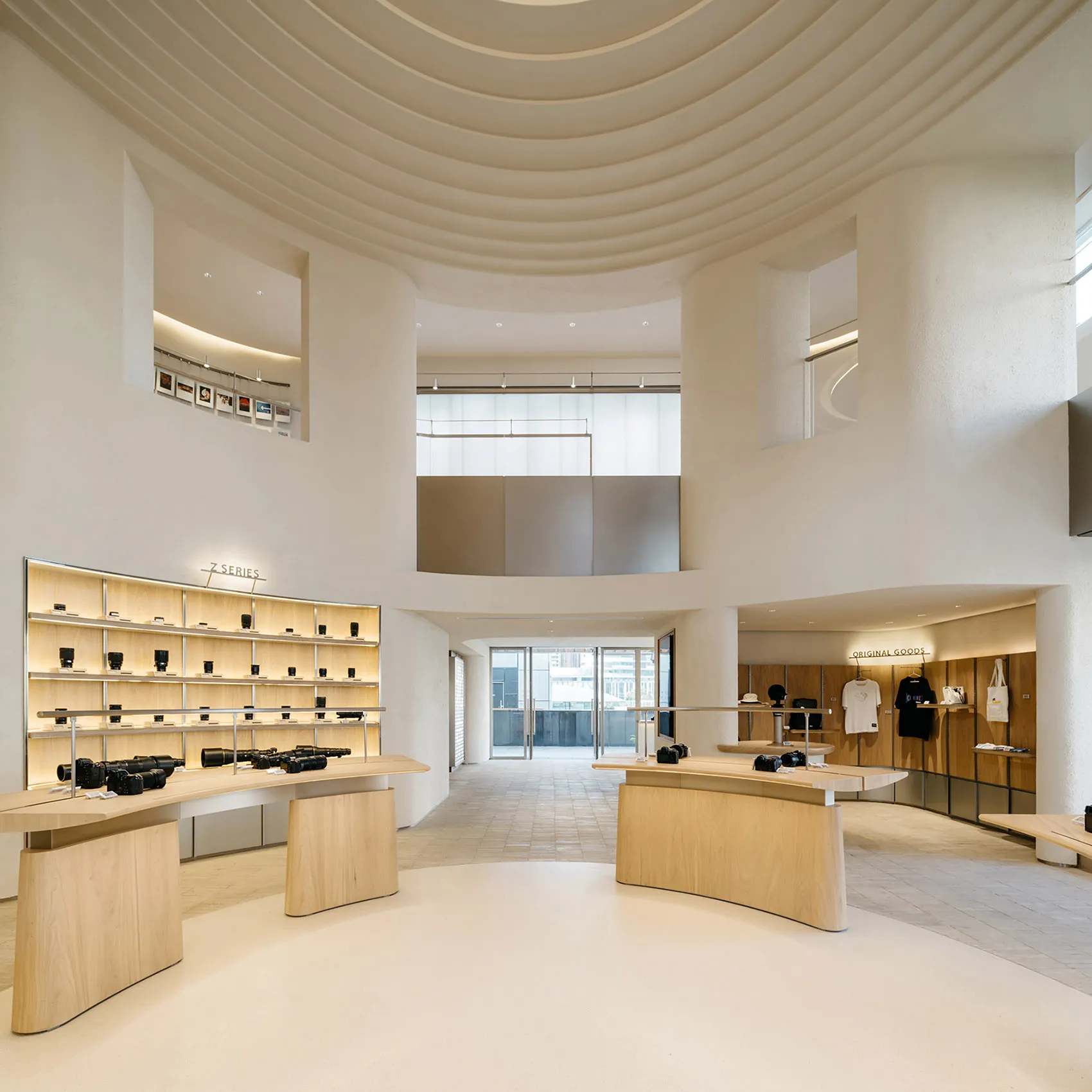 A modern photography store with a minimalist design and wooden interior