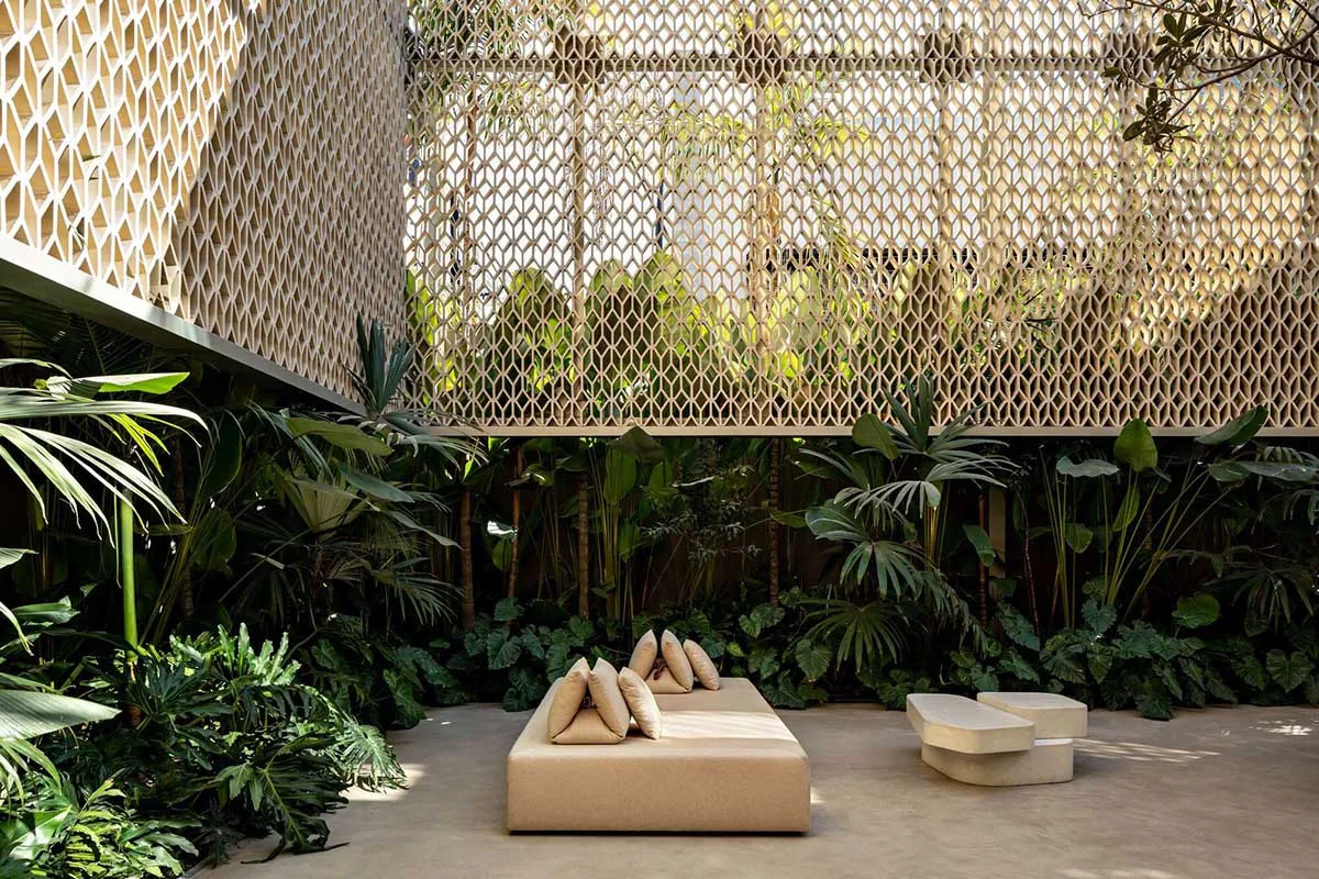 Modern industrial rooftop garden with concrete plants and wooden lattice