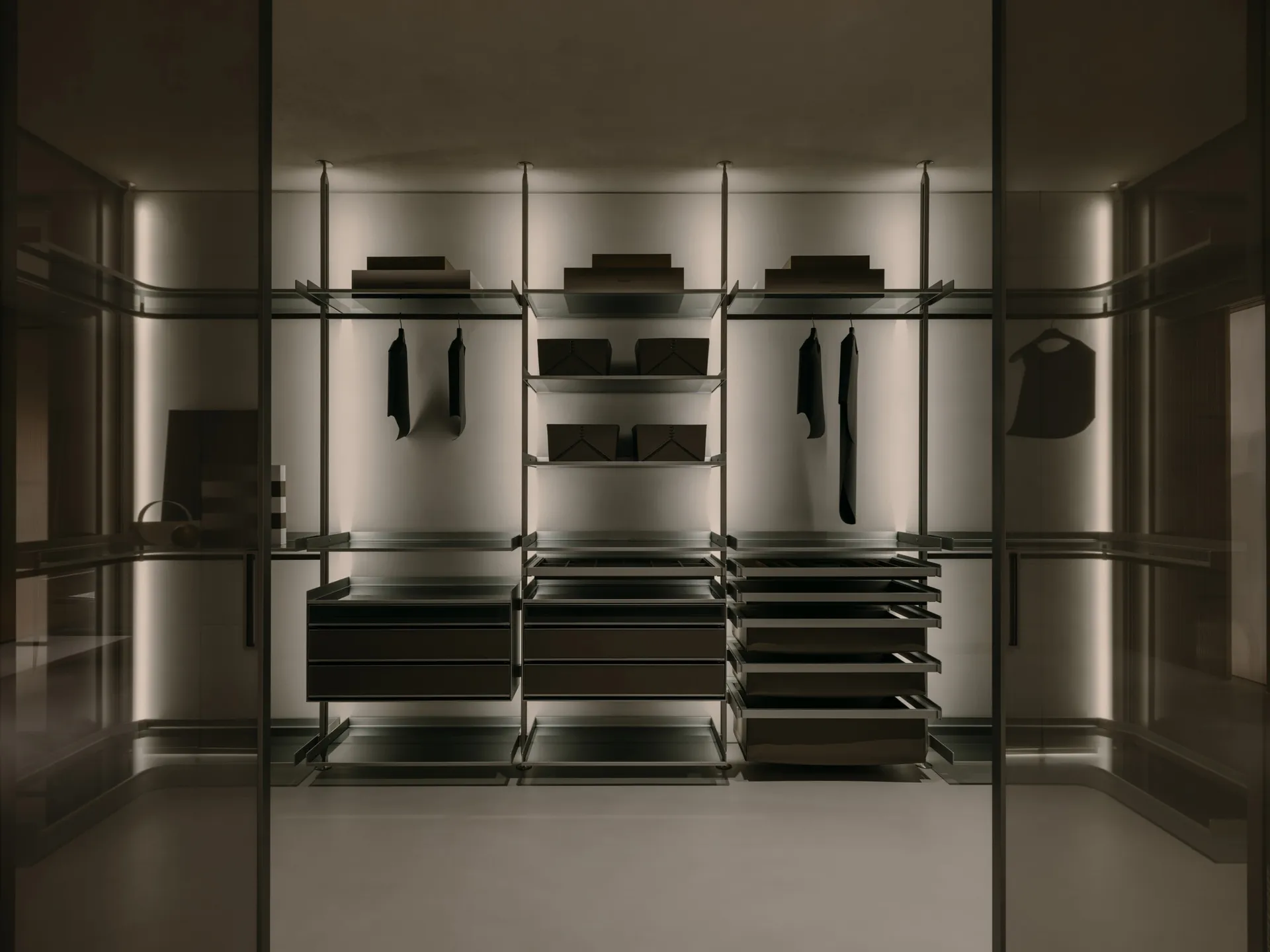Modern closet with glass doors and steel shelves, featuring sleek design and elegant storage solutions.
