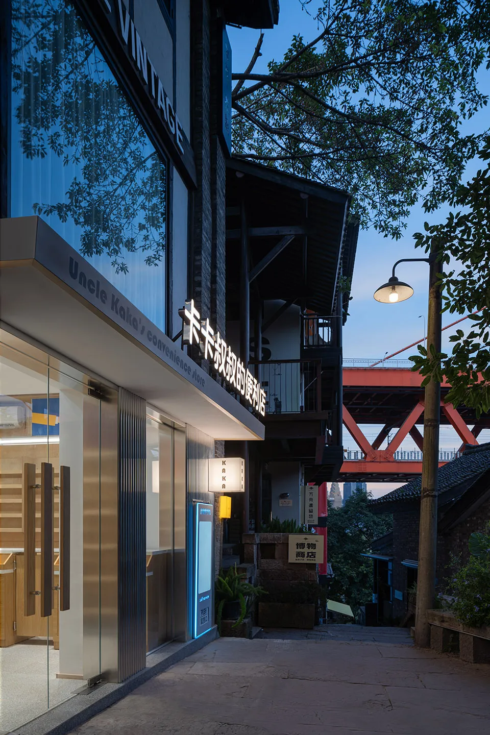 Modern retail storefront with glass storefront and blue lighting
