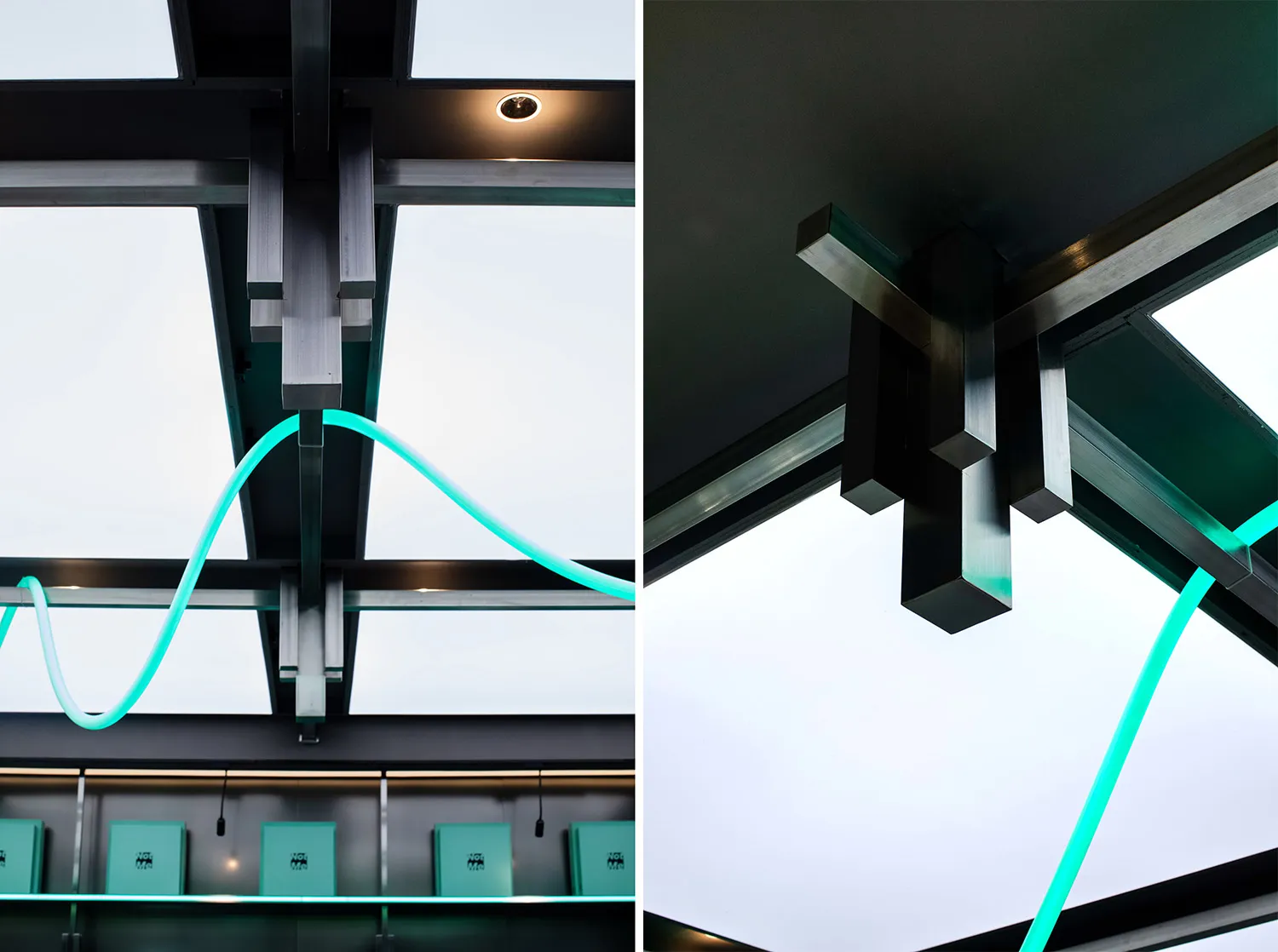 Metal beams and glass ceiling with LED lighting in an industrial design interior