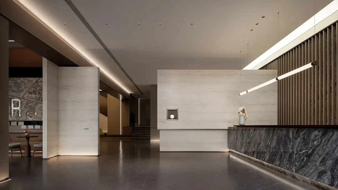 現代辦公室大廳採用大理石與混凝土材質,設有接待桌及吊燈燈具。