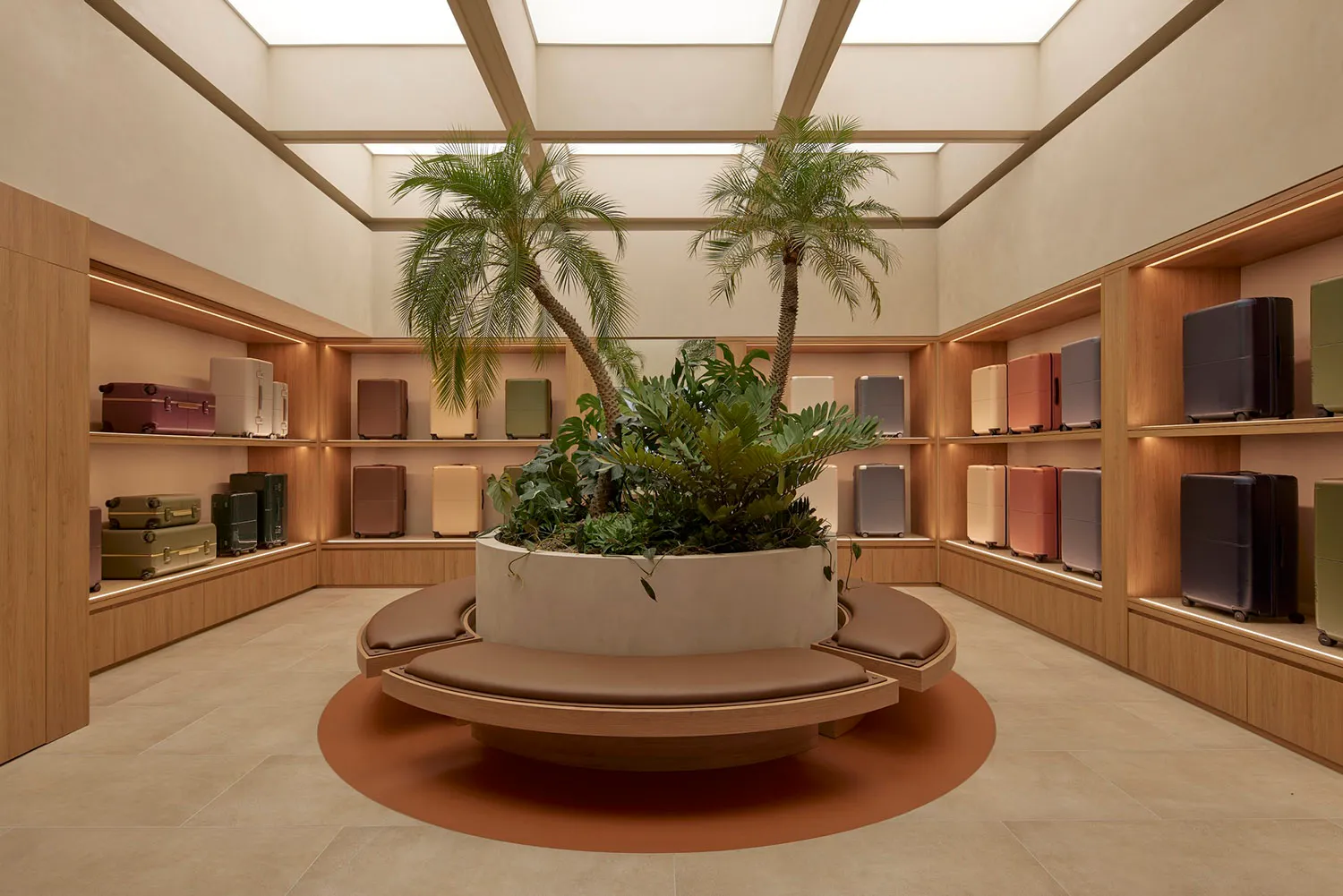 A modern retail storefront featuring wood and plant accents