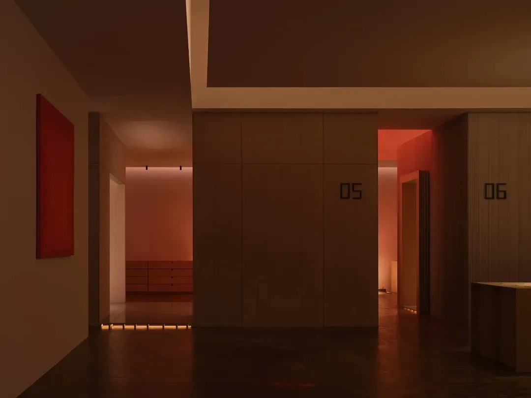 A modern interior with a red painting and light reflections on the floor.