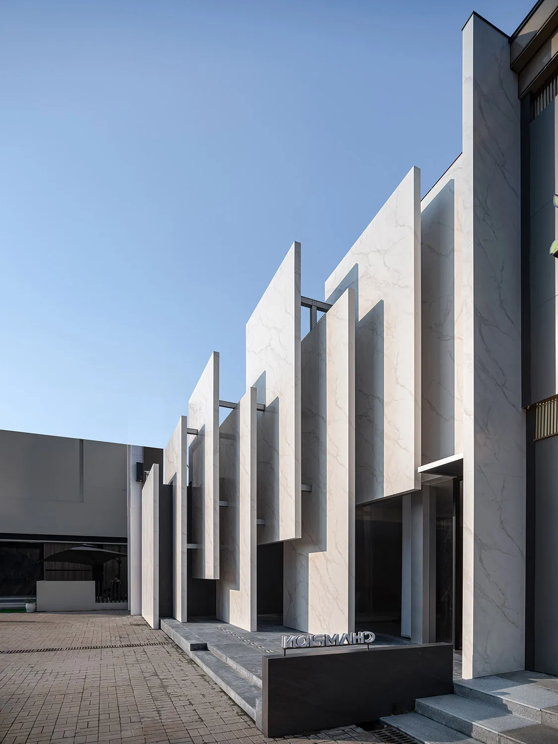 Modern exterior of a building with marble panels