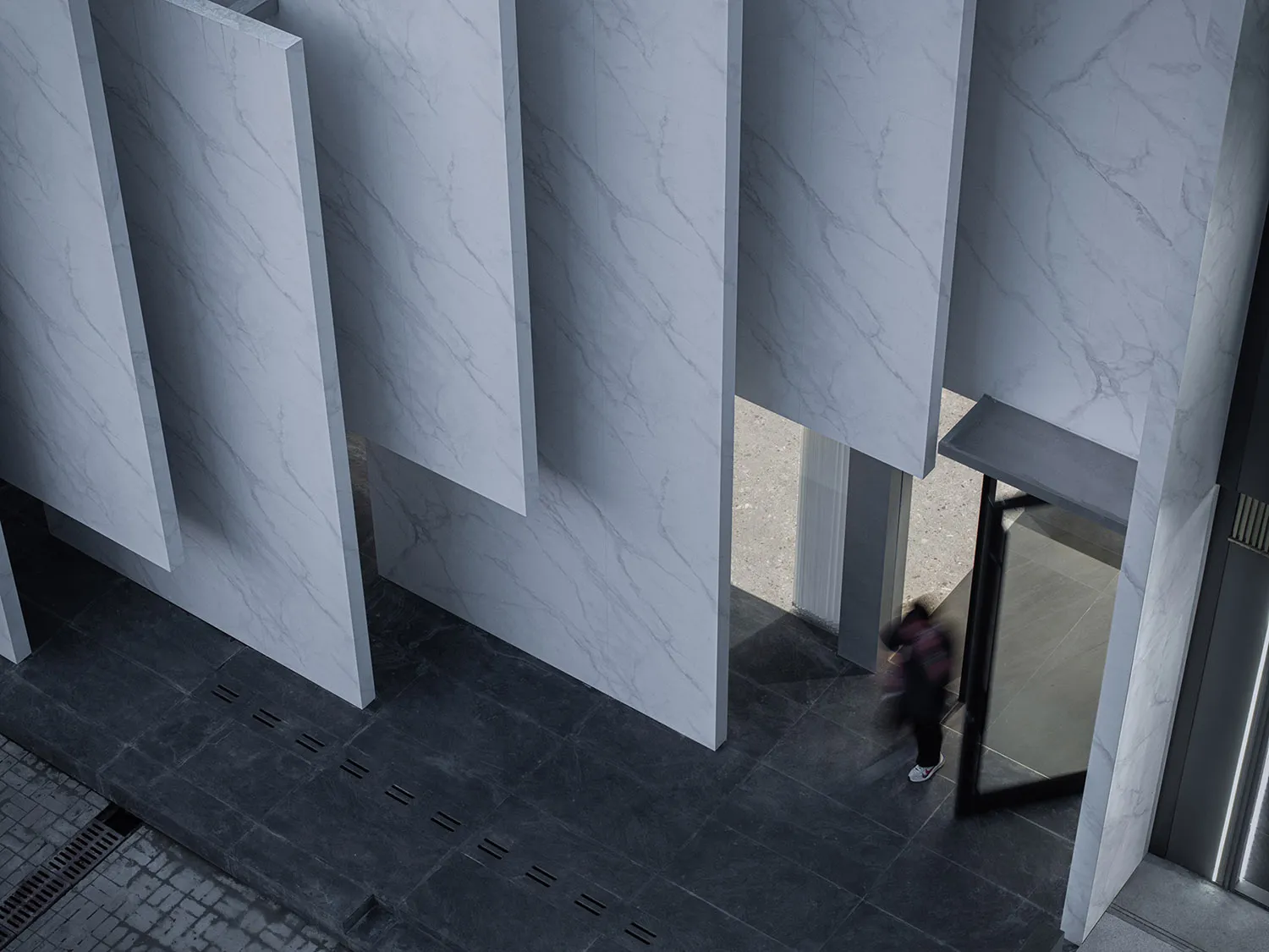 Modern building exterior with marble panels and glass windows