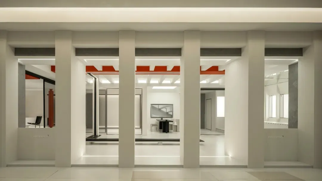 Modern office space featuring concrete and glass materials.