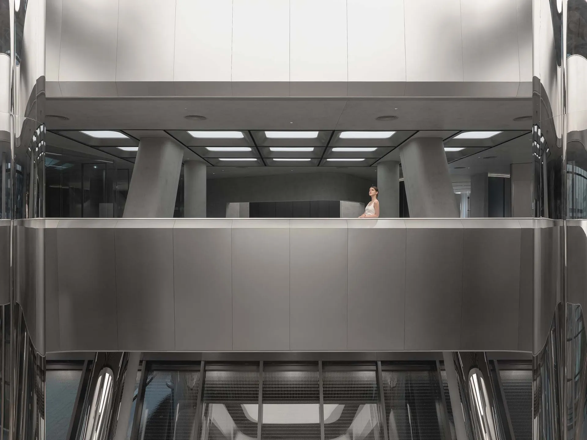A modern, industrial-style interior space featuring metallic elements.