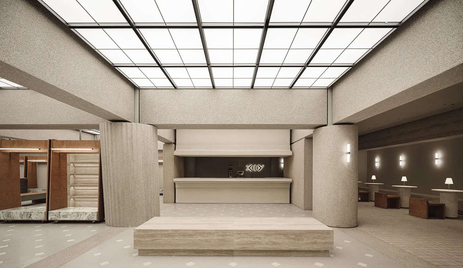 Modern lobby designed with concrete elements and open layout.
