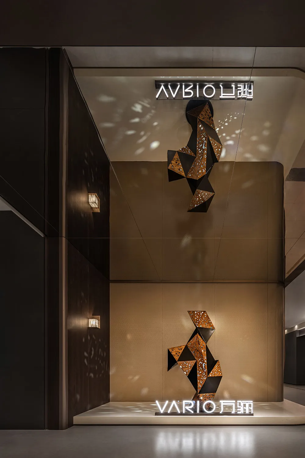 An industrial storefront featuring metallic geometric shapes.