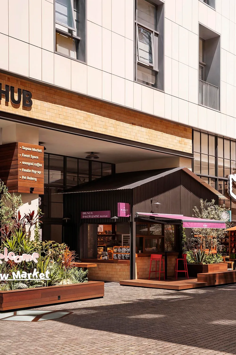 An urban retail storefront featuring wooden awnings, brick walls, and metal accents.