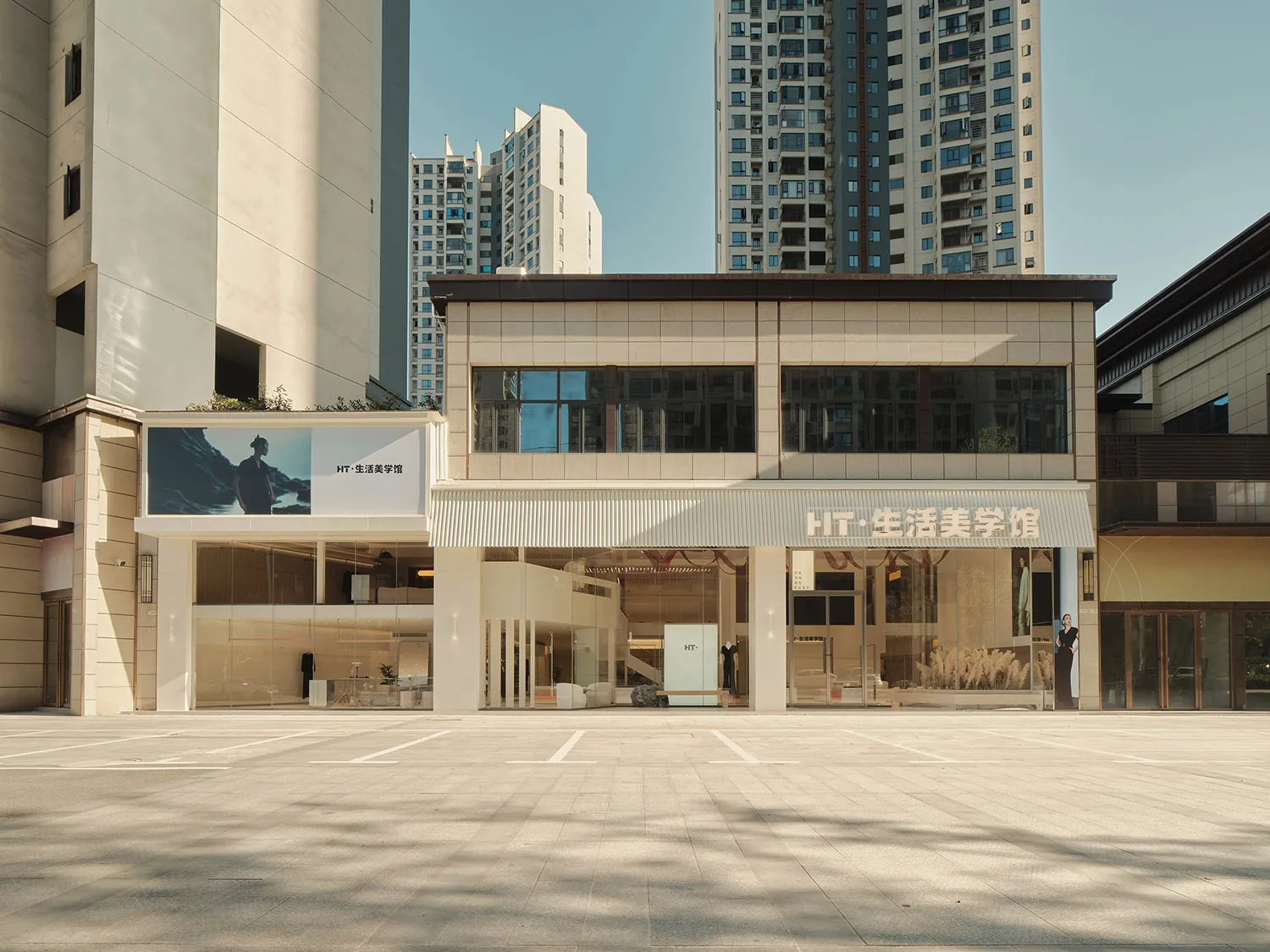 A modern retail storefront with glass walls and a clean, minimalist design.