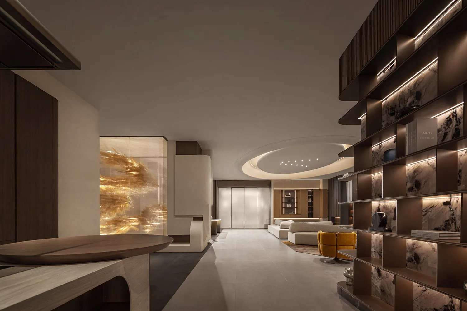 Modern minimalist living room featuring stone finishes and sleek, contemporary decor.
